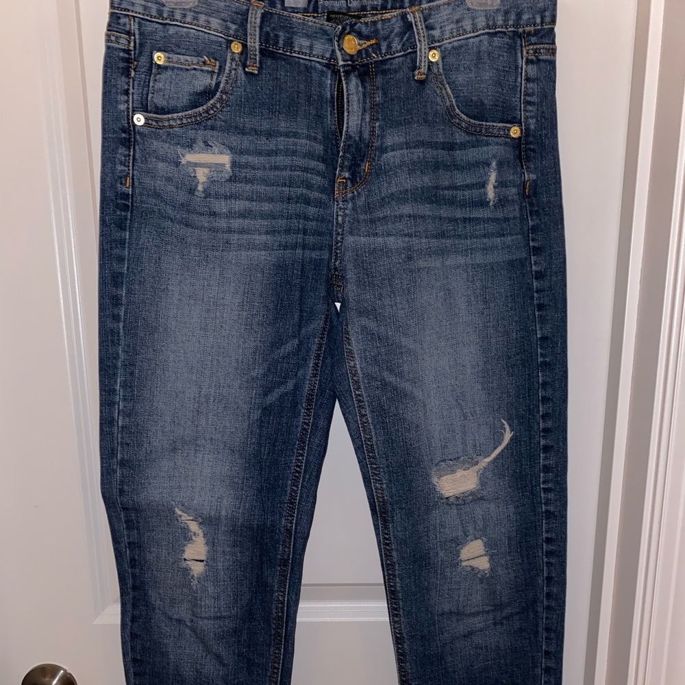 Medium wash, mildly distressed jeans